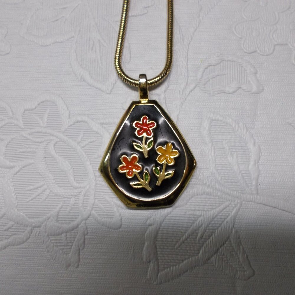 Vintage black stone necklace with red and yellow flowers on rope-like chain